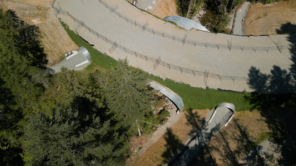 Aerial view of stream crossing with greened in headwall