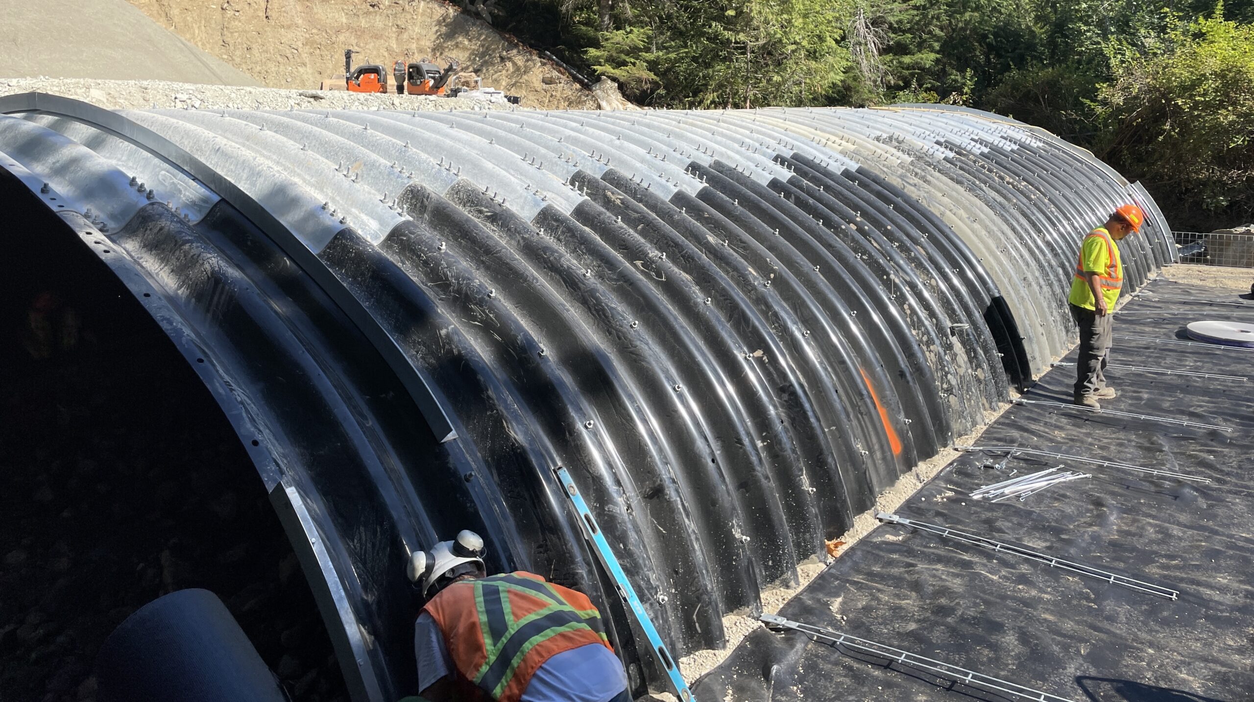 Side view of steel anchor rods on GRS culvert