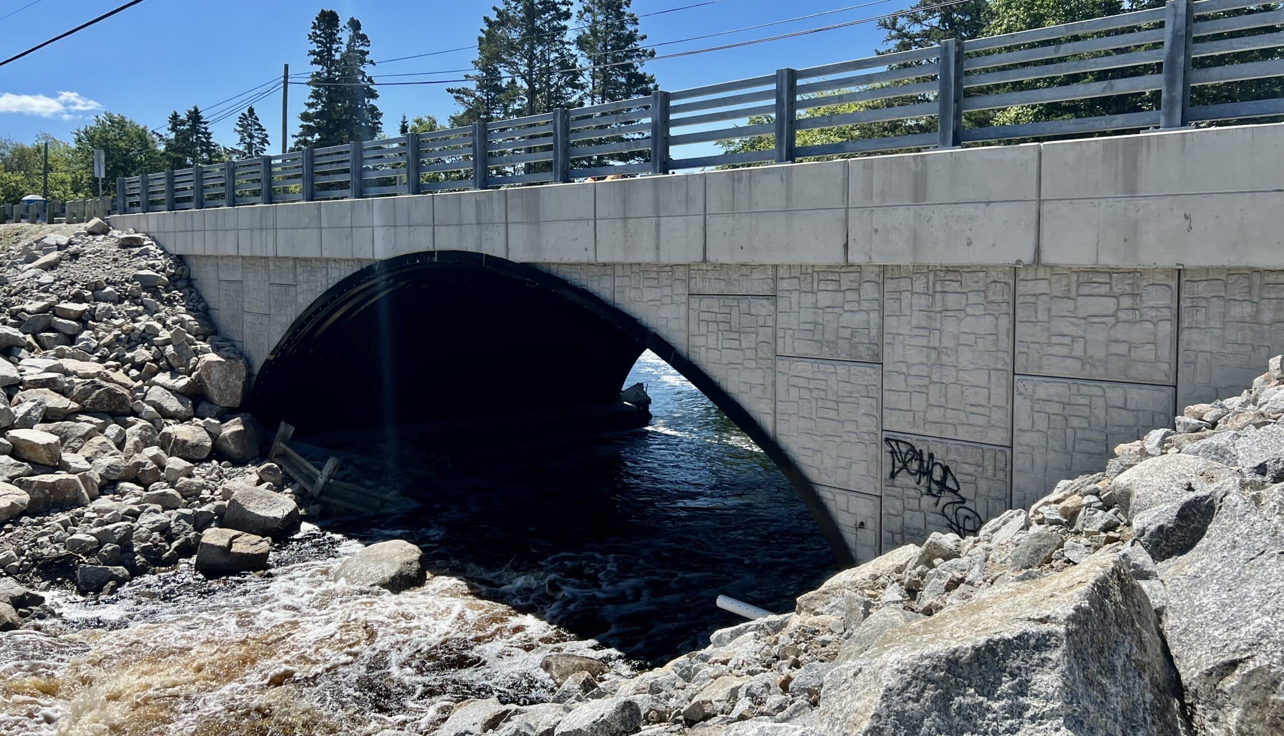 Upstream view with armour stone re-applied